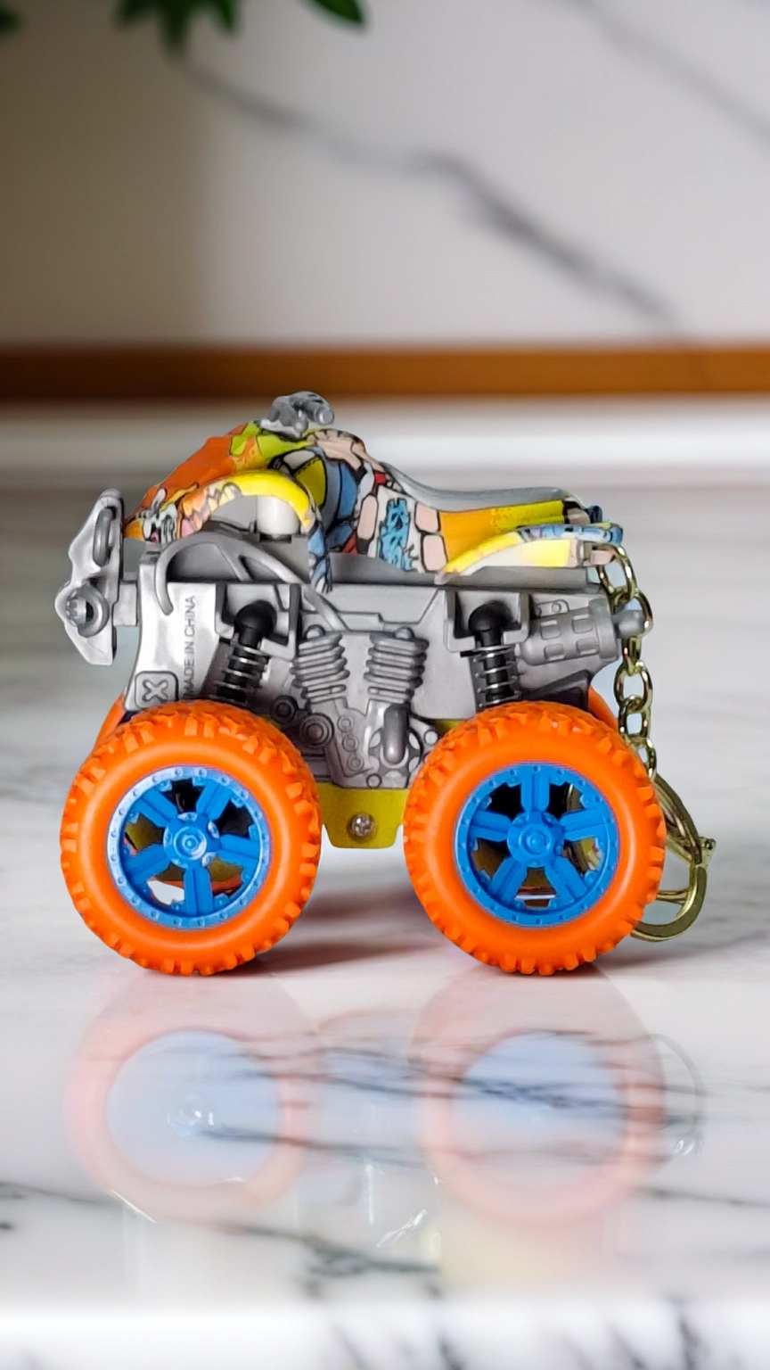 ATV Quad Monster Truck with Neon Orange Wheels & Graffiti Body Keychain | Hellzone